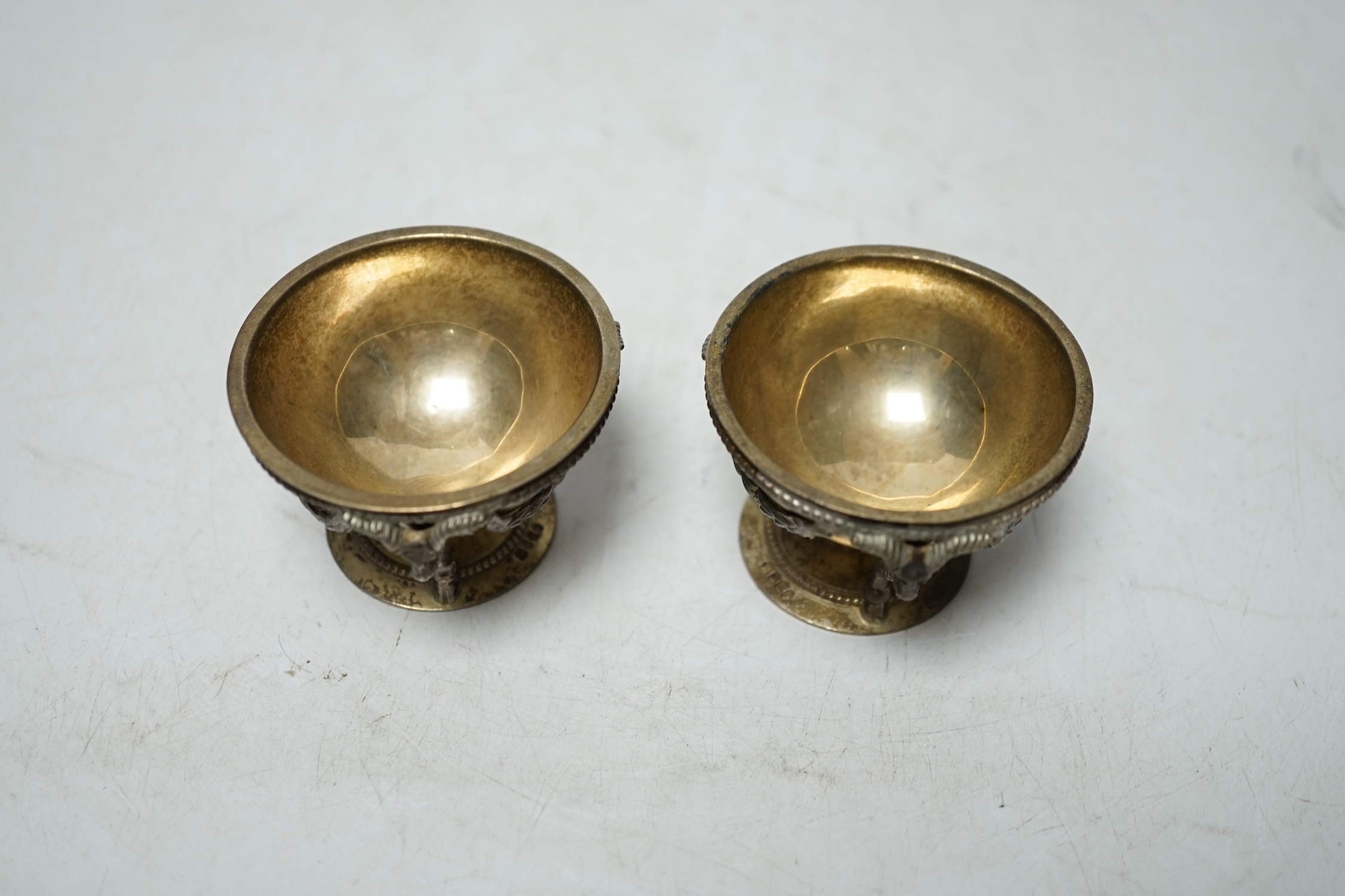 A pair of Victorian silver circular salts?, Martin, Hall & Co, London?, 1867, with removeable dishes and helix stems (part of a cruet stand?), diameter 56mm. Condition - poor. Solder repairs.